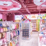 Inside a Minoso shop with lots of pink decoration and products.