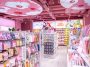 Inside a Minoso shop with lots of pink decoration and products.