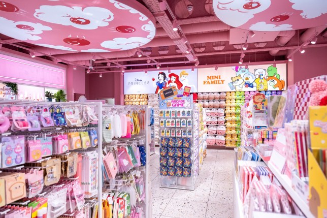 Inside a Minoso shop with lots of pink decoration and products.