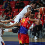 Cliff Hodge of Meralco (top) lands hard on Phoenix’s Jason Perkins. — PBA IMAGES