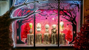 Sculptures from Tim Burton's private collection are featured in one of the British retailer's Christmas windows.