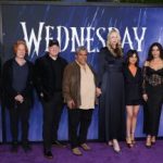 Jennifer Malone, Danny Elfman, Alfred Gough, Luis Guzmán, Gwendoline Christie, Jenna Ortega, Catherine Zeta-Jones, and Miles Millar at the photo call for "Wednesday" held at Hollywood Forever Cemetery on April 29, 2023 in Los Angeles, California. (Photo by Mark Von Holden/Variety via Getty Images)