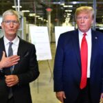 US President Donald Trump (r) and Apple CEO Tim Cook speak to the press during a tour of the Flextronics computer manufacturing facility where Apple’s Mac Pros are assembled in Austin, Texas, on November 20, 2019.