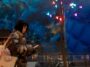 A shopper walks past Christmas lights at a shopping centre in Beijing, China