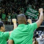 La Salle coach Topex Robinson sing the Green Archers' hymn in front of the fans after the UAAP Season 87 men's basketball finals. UP won the championship in Game 3.