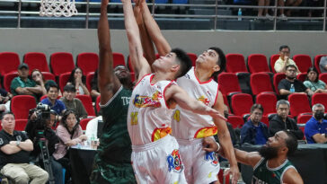 Leonard Santillan (middle) and Rain or Shine were stretched totheir limits by Terrafirma. —AUGUST DELA CRUZ