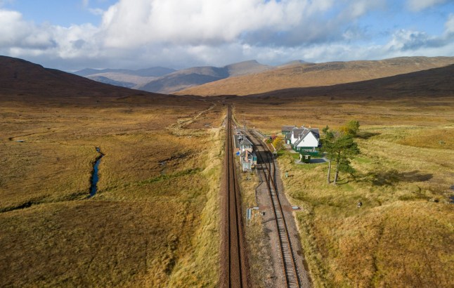 Aerial drone shot of Corrour train station and the west highland way line across Rannoch Moor; Shutterstock ID 2536898537; purchase_order: -; job: -; client: -; other: -