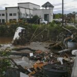 At hurricane site, Trump considers axing disaster agency