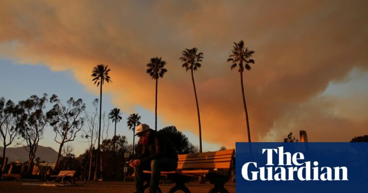 California fires: 11 killed and 10,000 structures destroyed as blazes continue