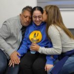 Released Israeli soldier, Liri Albag, embraces loved ones after being released, in an unknown location, on Saturday.