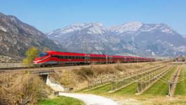 Frecciarossa FS ETR 1000 high-speed train of Trenitalia on Brenner Railway near Avio in Italy